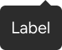 An arrow is positioned along the top edge of a rounded rectangle that includes sample label text. The arrow is inset to align with the right edge of the label.